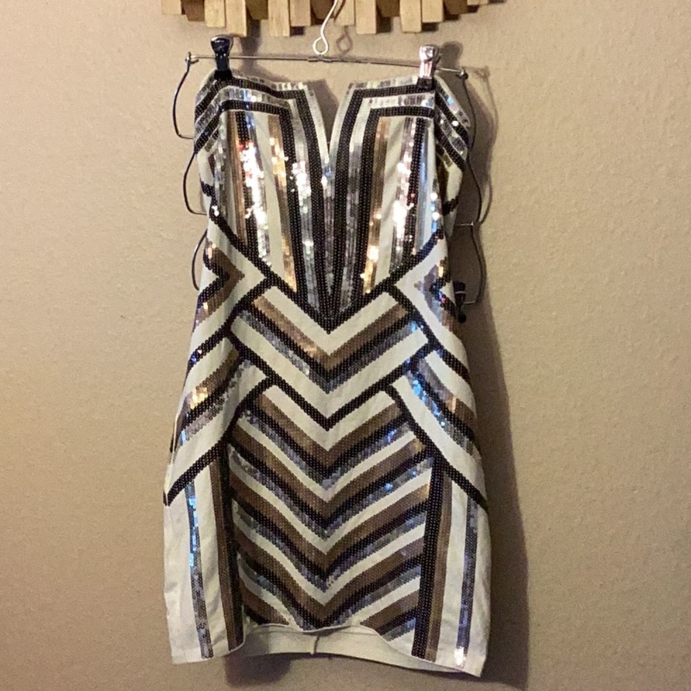 Beautiful Express stretchy strapless black silver and gold sequins on cream col